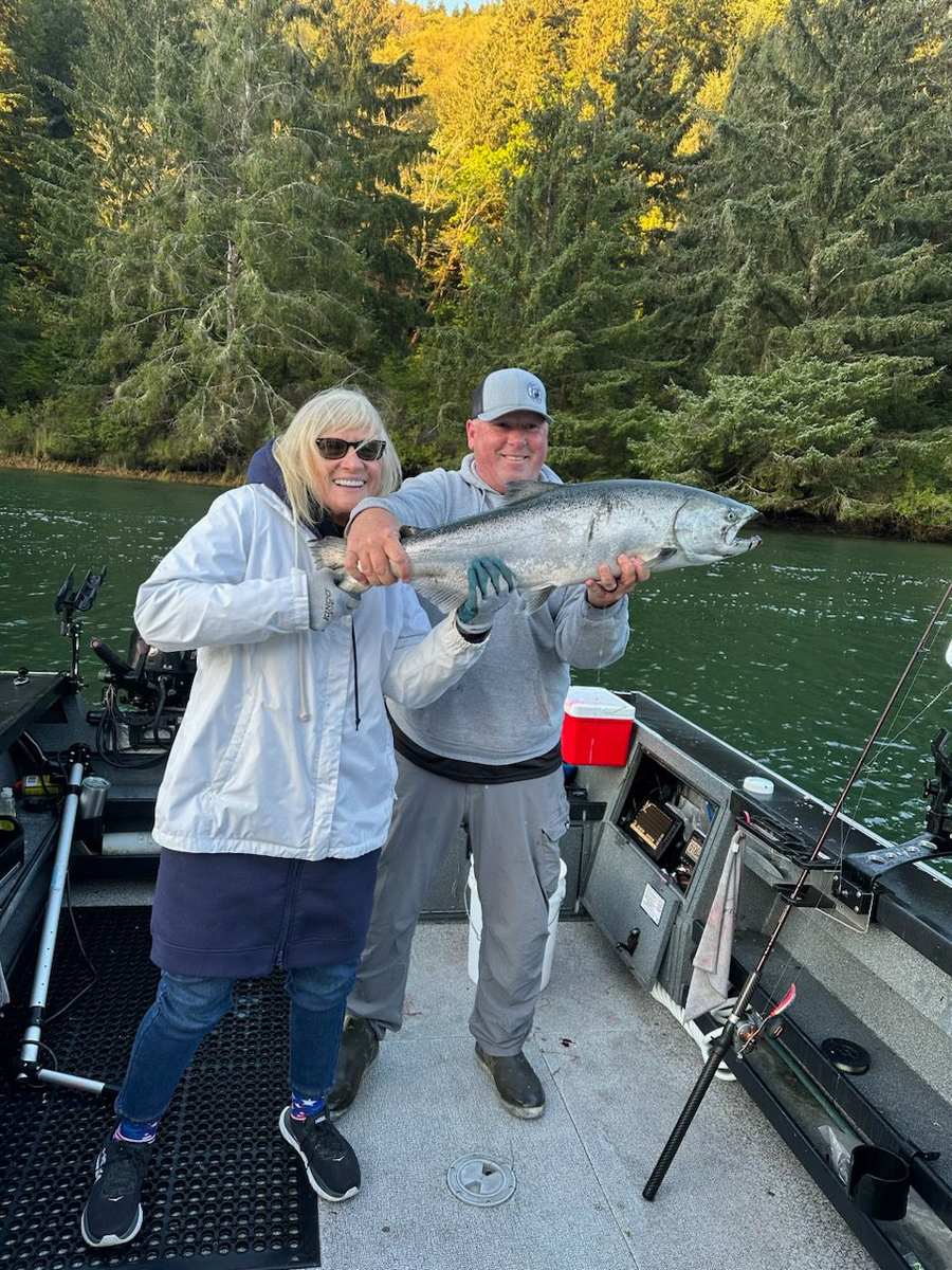 Angler with a fall Chinook caught on the Siletz River